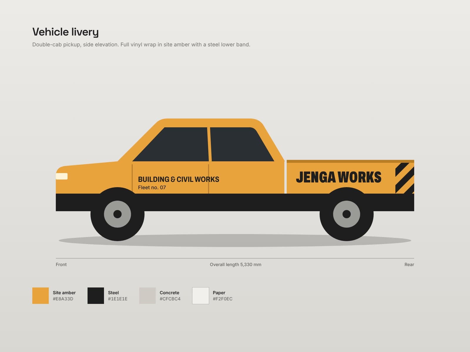 Side view of a pickup truck in Jenga Works amber and steel livery, with colour swatches